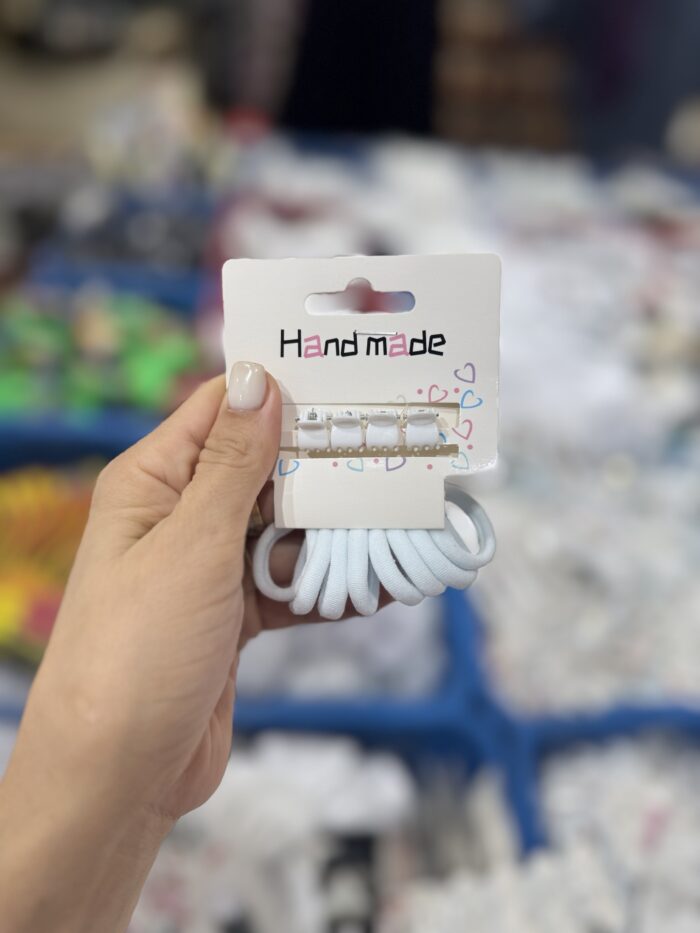 ⁦طقم ربطات شعر قطنية بيضاء مع مشابك⁩ - الصورة ⁦1⁩