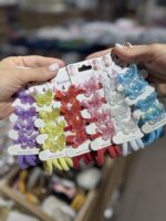 طقم ربطات شعر مزيّن بالفراشات