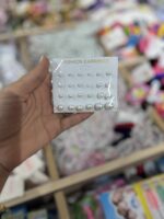 ⁦أقراط لؤلؤ متعددة الأحجام – طقم 12 زوج⁩ - الصورة ⁦4⁩